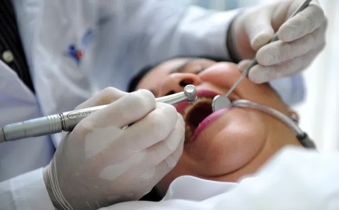 Hối hận sau khi làm răng sứ